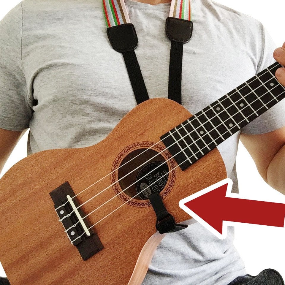 Pros and cons of different straps for ukulele on the market. No drilling necessary