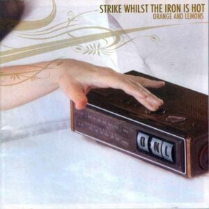 Strike Whilst The Iron Is Hot album image