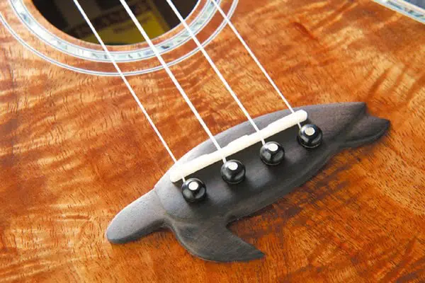 how to change ukulele strings with bridge pins